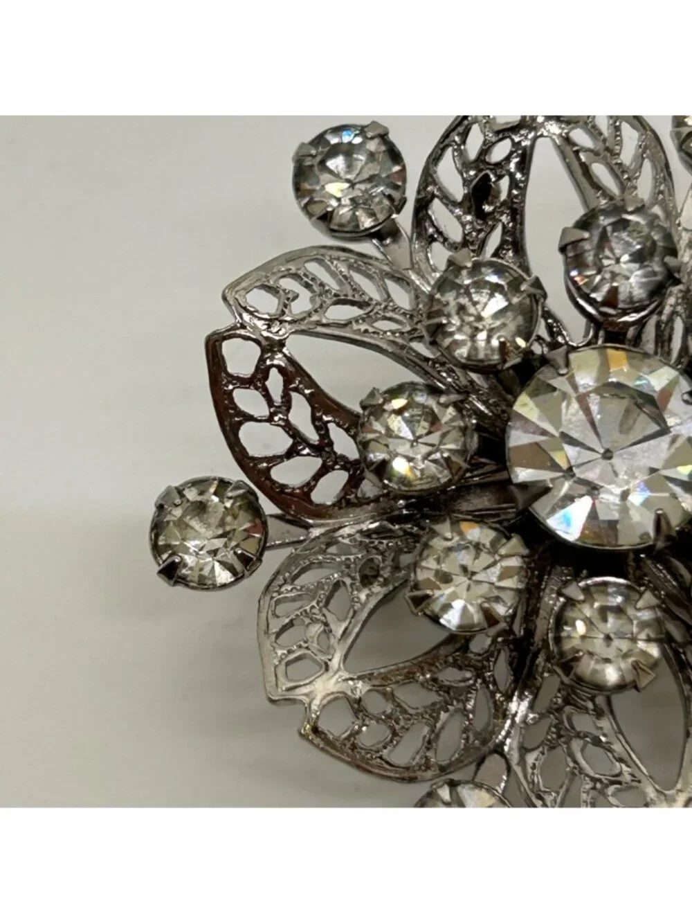 Vintage Silver Tone Rhinestone Brooch Pin Clear Crystal Floral Filigree Mid Cent